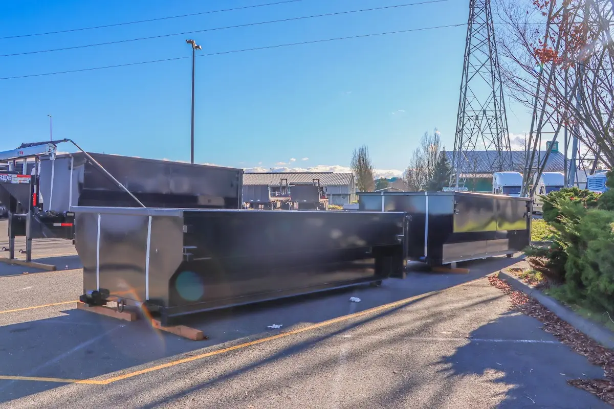 Roll-off dumpster ready for waste disposal at job site for 2 Yard Dumpster Rental in Cottonwood